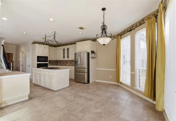 a view of a hallway with seating area