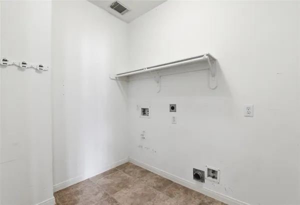 a bathroom with a sink mirror and toilet