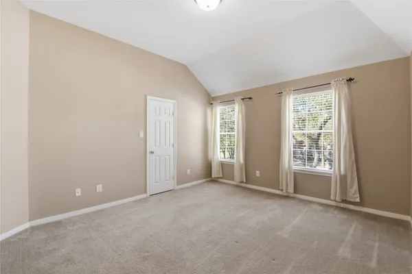 an empty room with an entryway
