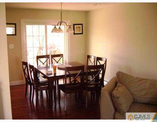 34 Baldwin Road Edison, NJ 08817 - Photo 4 of 8 a view of a dining room with furniture and window