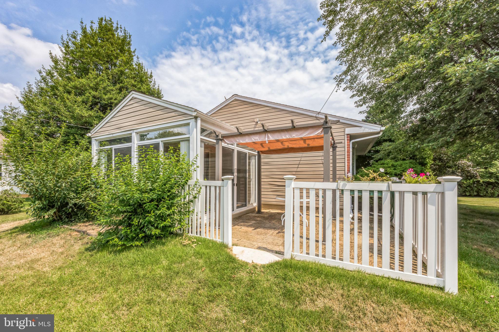 709 Windsor Place Wallingford, PA 19086 - Photo 30 of 35 Patio off of sunroom