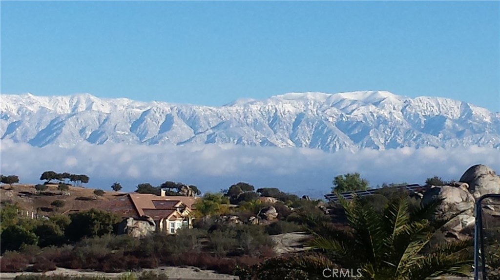22990 Sky Mesa Road Homeland, CA 92548 - Photo 11 of 15 an aerial view of a house with a yard