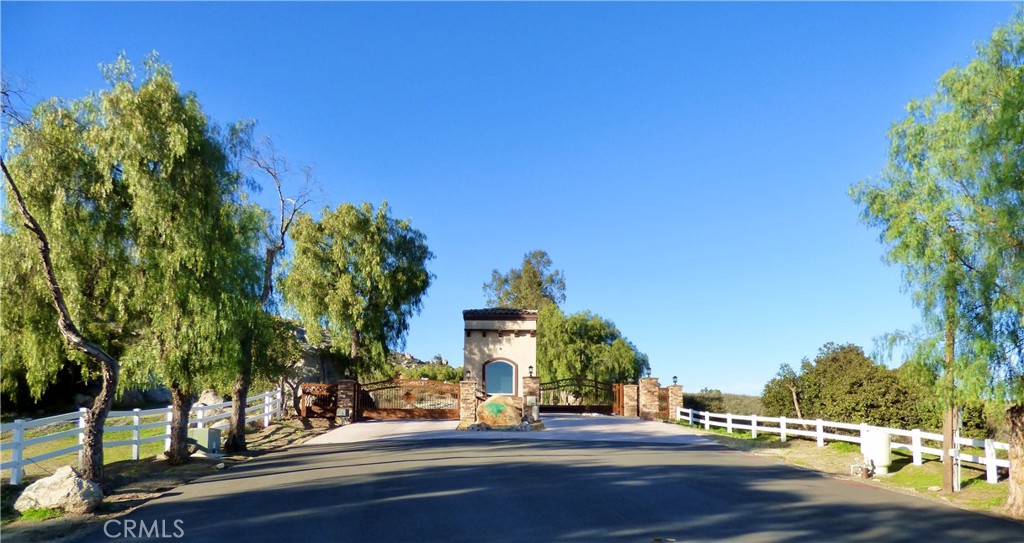 22990 Sky Mesa Road Homeland, CA 92548 - Photo 8 of 15 a view of street along with trees