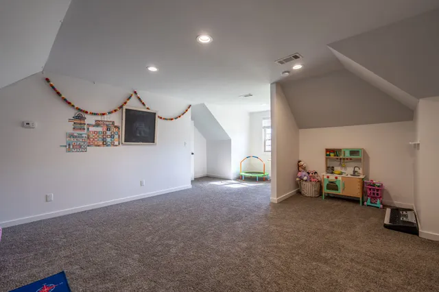 a view of a livingroom and a kitchen