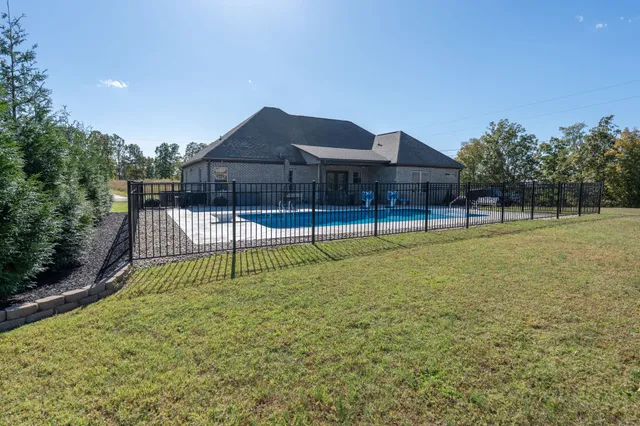 a view of outdoor space and backyard