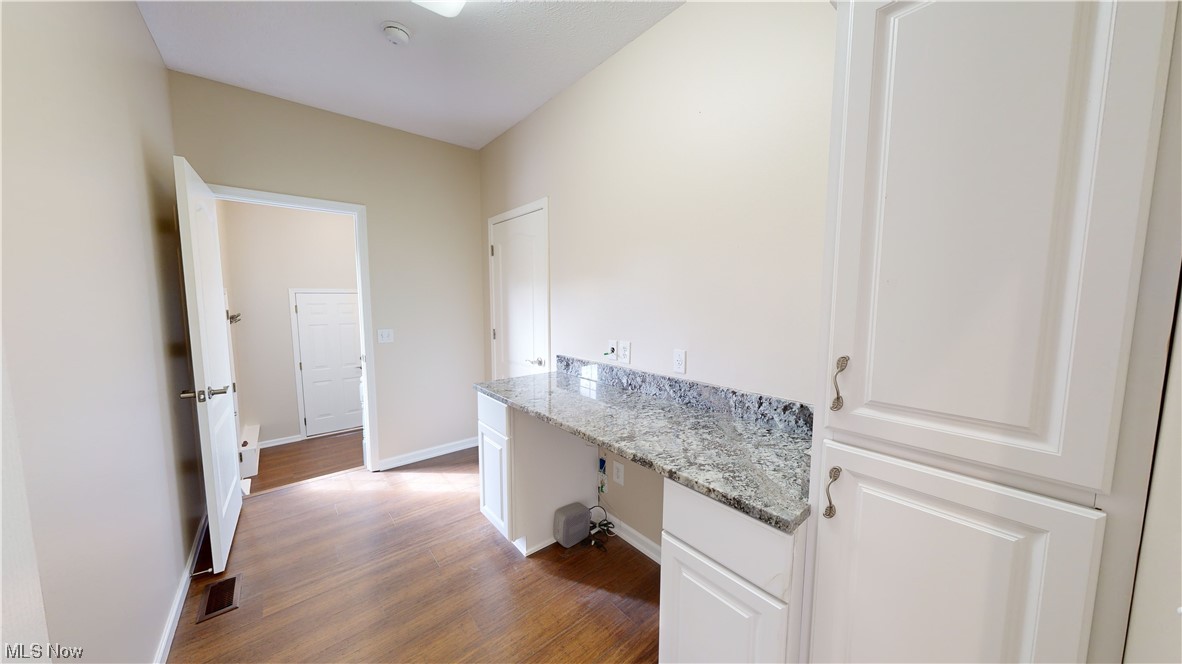 8325 Munson Road Mentor, OH 44060 - Photo 27 of 35 Hallway featuring light hardwood flooring