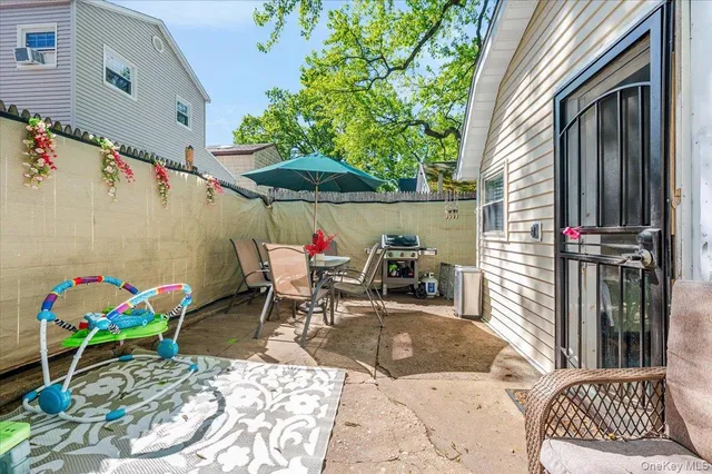 an outdoor space with furniture