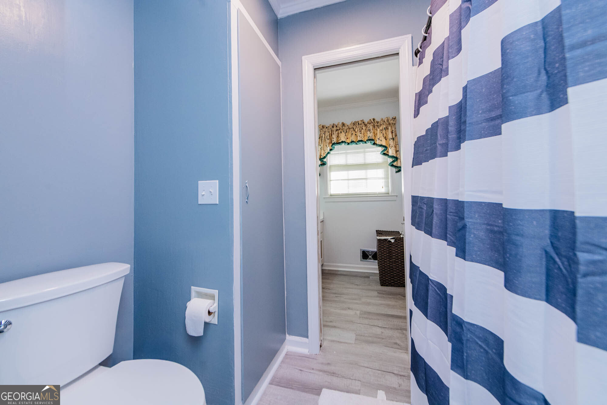 5207 Forest Lake Road Eastman, GA 31023 - Photo 27 of 56 a bathroom with a toilet and a shower