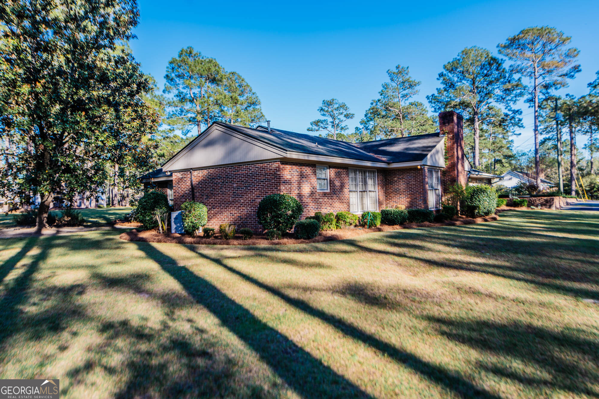 5207 Forest Lake Road Eastman, GA 31023 - Photo 52 of 56 a front view of a house with a yard