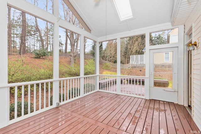 a view of a balcony with wooden floor