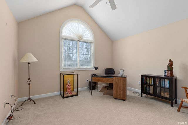 a room with furniture and window