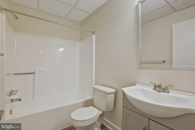 a view of an empty room and closet