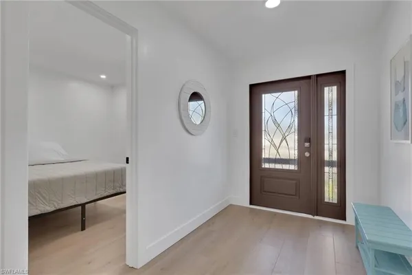 a view of livingroom with hardwood floor and hallway