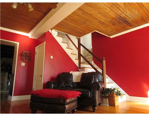 405 Malden Road California, PA 15423 - Photo 11 of 18 Living Room. looking toward staircase you can see the character of this house is from floor to ceiling!