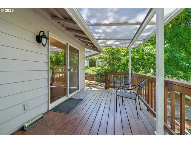 a view of deck with furniture and wooden floor
