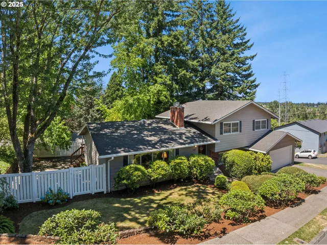 front view of a house with a garden