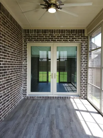 a view of lobby with a floor to ceiling window