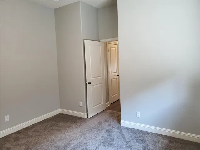 an empty room with a door