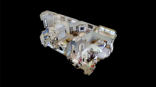 an aerial view of a house with outdoor space