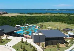 a view of a lake with a yard