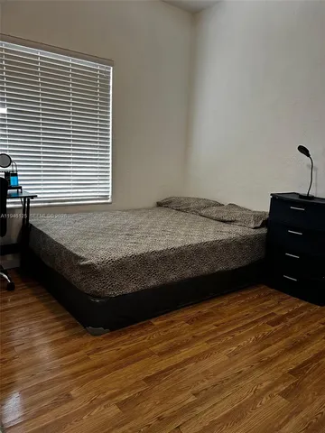 a view of a livingroom with furniture and window