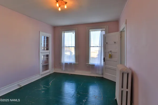 a view of a hallway with interior of house