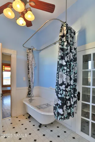 a kitchen with granite countertop a refrigerator and a sink
