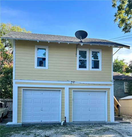 a view of a house with a large window