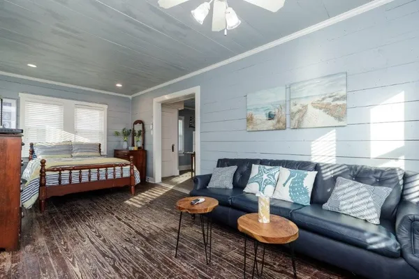 a living room with furniture and a table