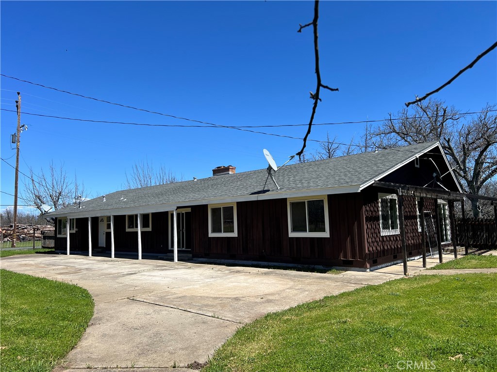 a view of a house with a garden