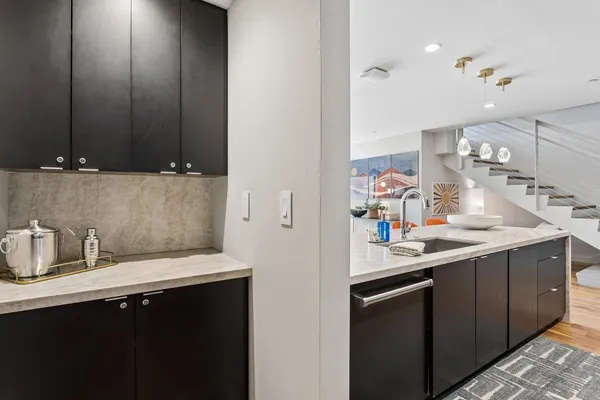 a kitchen with a sink and a cabinets