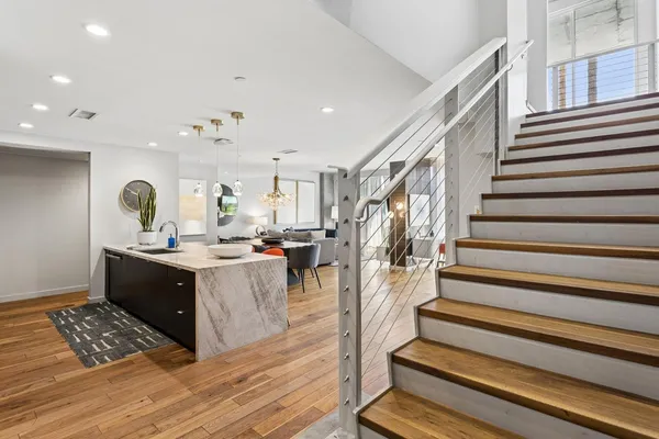 a kitchen with sink and cabinets