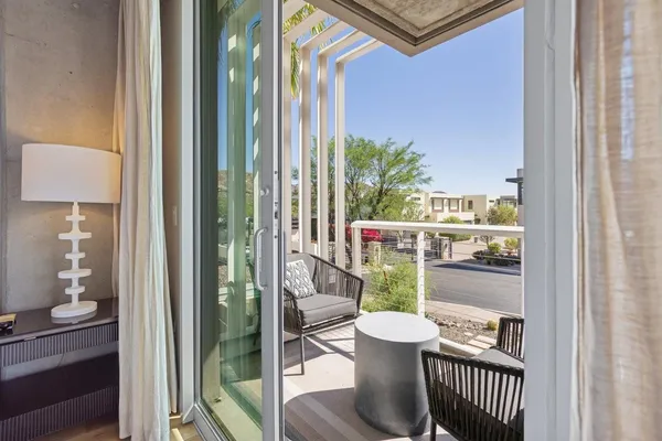 a view of a porch with furniture