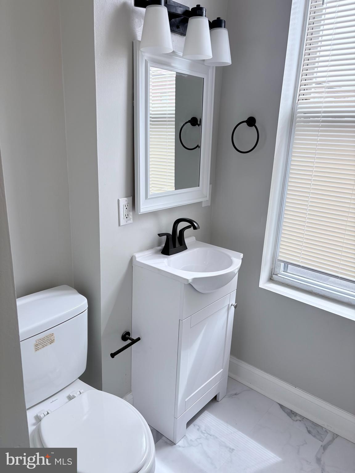 32 South Fulton Avenue, Unit 2 Baltimore, MD 21223 - Photo 13 of 14 Renovated Bathroom