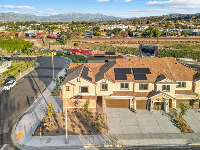 a view of a city with an ocean view