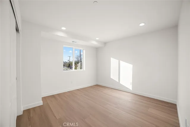 a bathroom with a shower sink and mirror