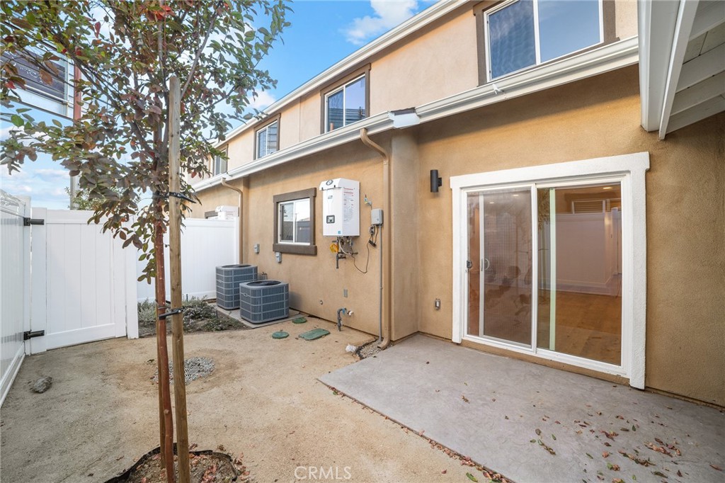 900 South Hert Street Colton, CA 92324 - Photo 22 of 26 a view of a house with a yard