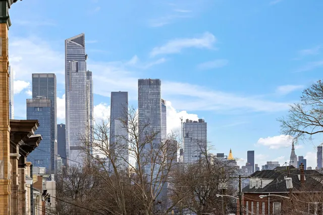 a view of city with tall buildings