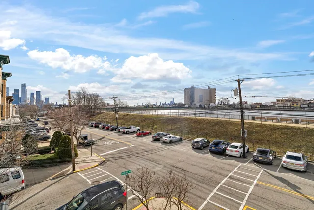 a view of a terrace with a table and chairs