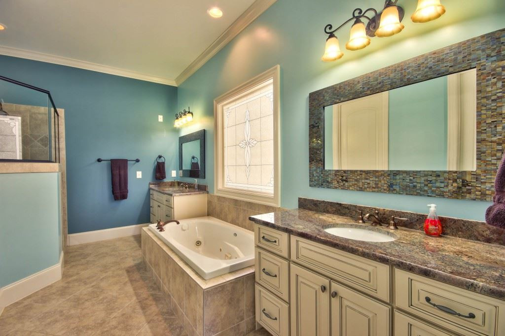 3417 Ebenezer Church Road Raleigh, NC 27612 - Photo 14 of 25 Upscale luxury master en suite! Double vanities, separate tiled shower with 2 shower heads, a separate water closet, HUGE w/i closet for your convenience! Master Bath/Spa