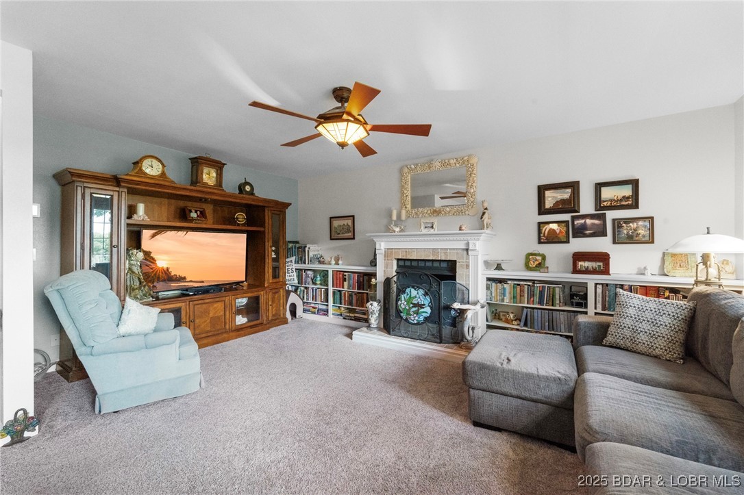 1008 South Beacon Ridge Lake Ozark, MO 65049 - Photo 14 of 50 Fireplace with built-in book cases.