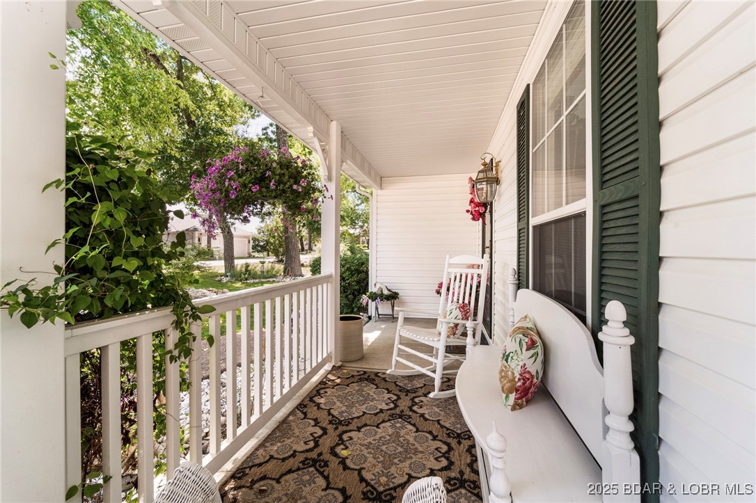 1008 South Beacon Ridge Lake Ozark, MO 65049 - Photo 4 of 50 Front porch enjoyment
