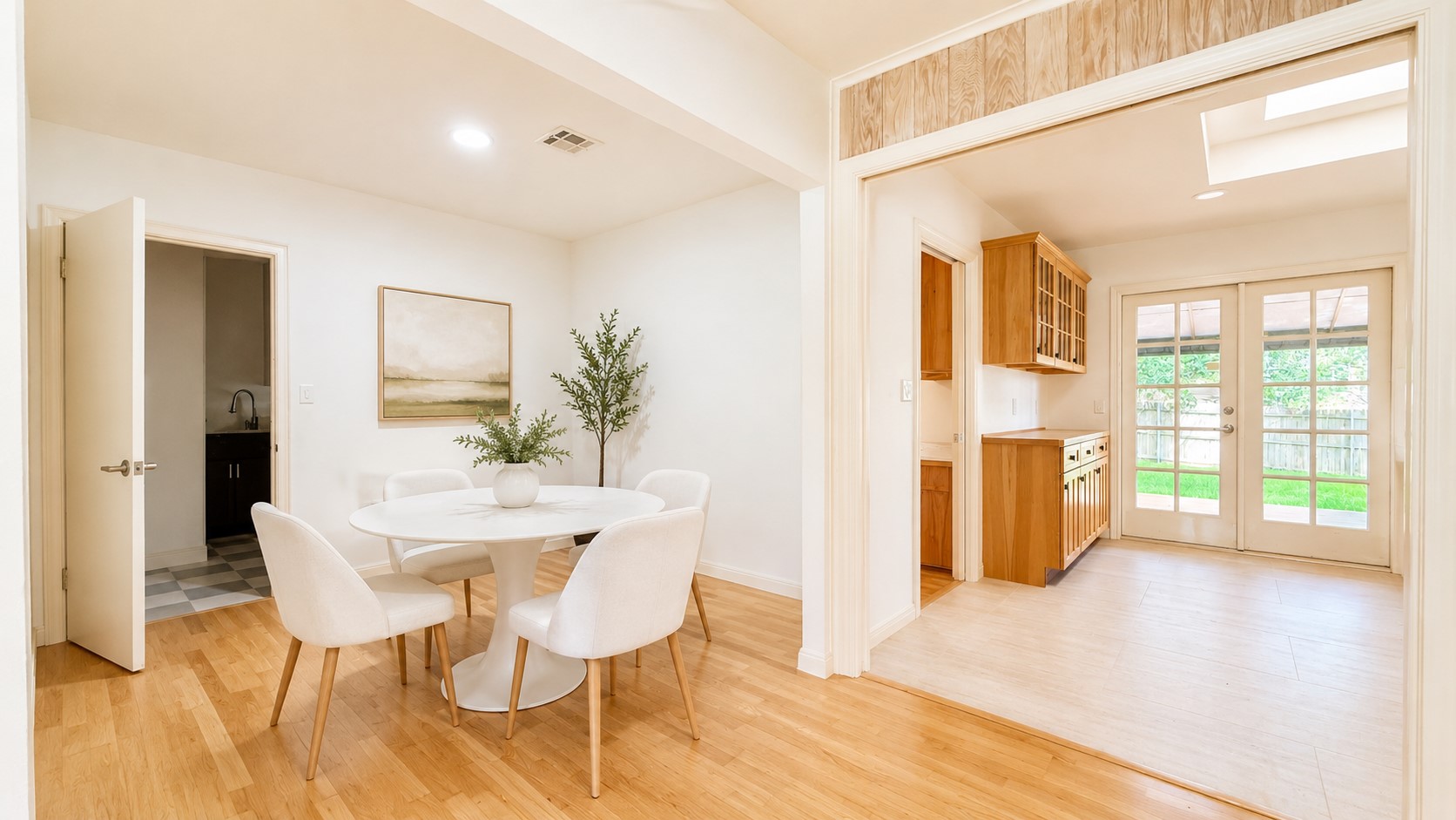 405 Ridgewood Road Austin, TX 78746 - Photo 6 of 22 Open concept dining area with hardwood-style flooring,