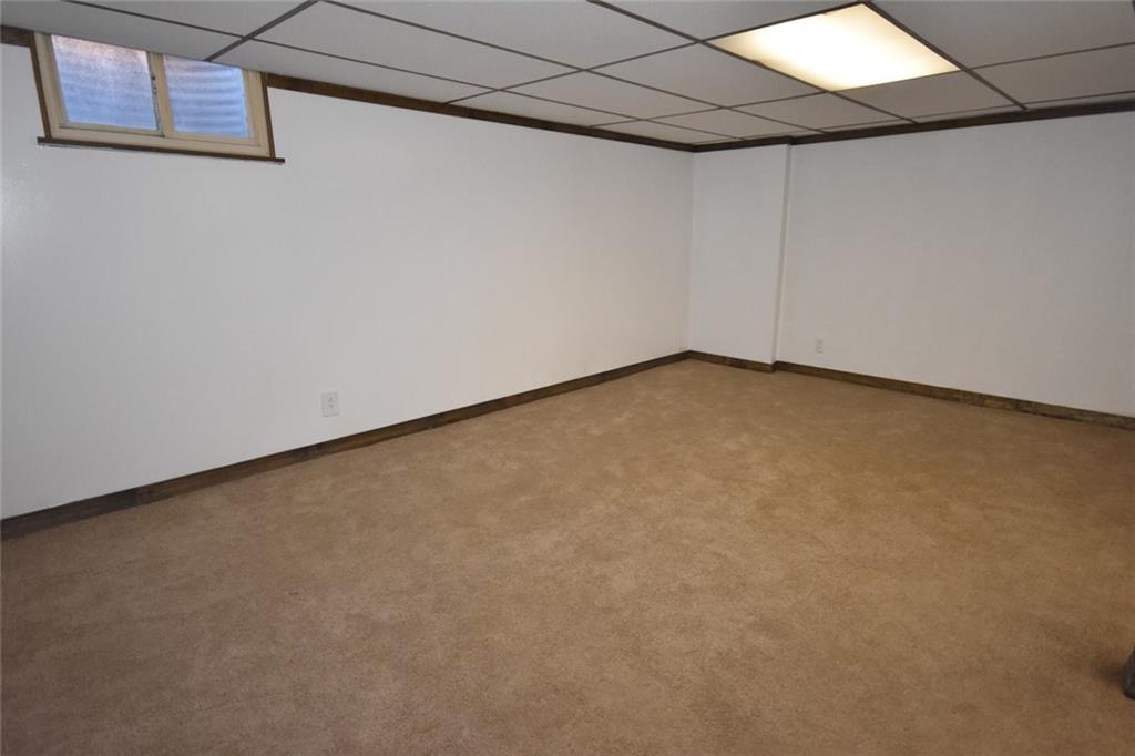 575 Kelso Road Pittsburgh, PA 15243 - Photo 14 of 24 Lower level game room/den/office/guest room. New carpet, new outlets, fresh paint and access to another full bath.
