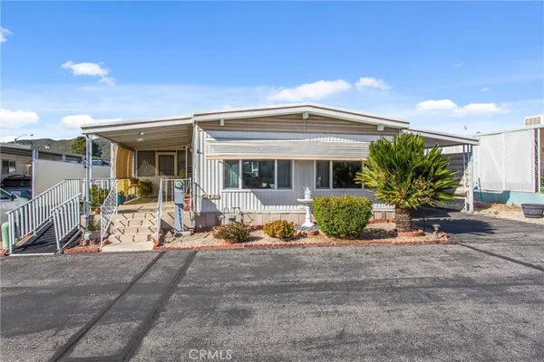 a view of a house with patio
