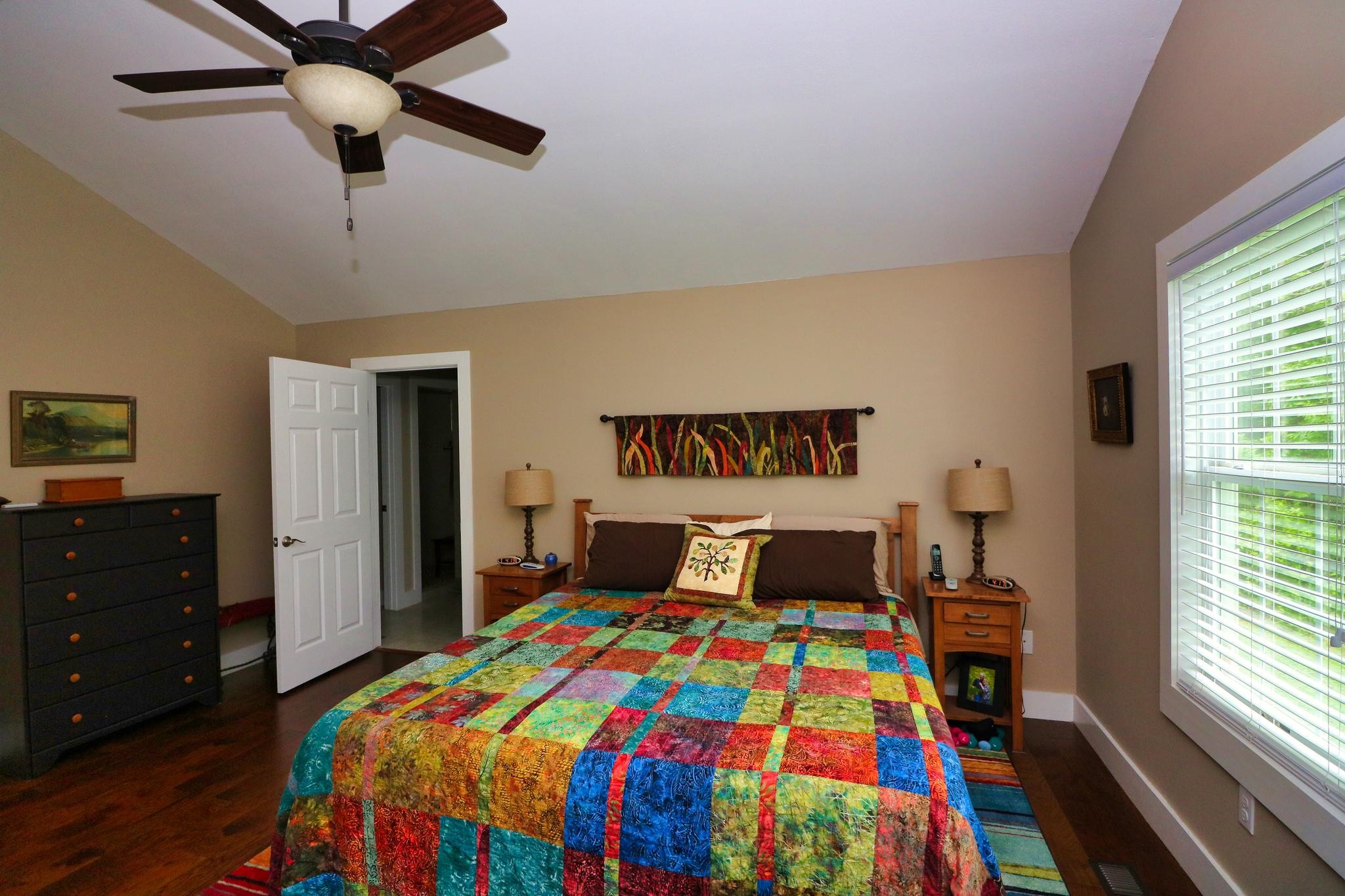 2090 Fairview Road Tellico Plains, TN 37385 - Photo 17 of 40 a bedroom with a bed and a window