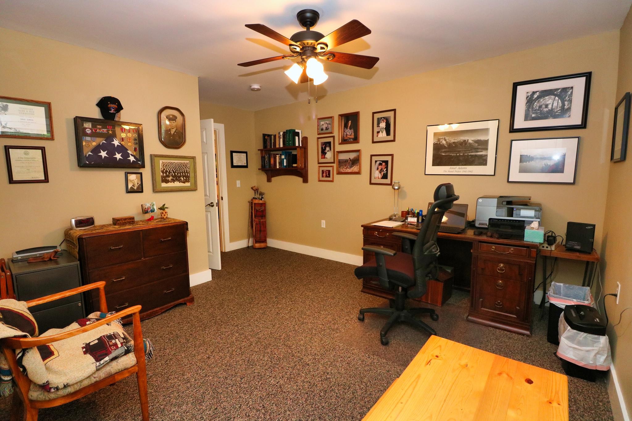 2090 Fairview Road Tellico Plains, TN 37385 - Photo 20 of 40 a livingroom with workspace and a couch