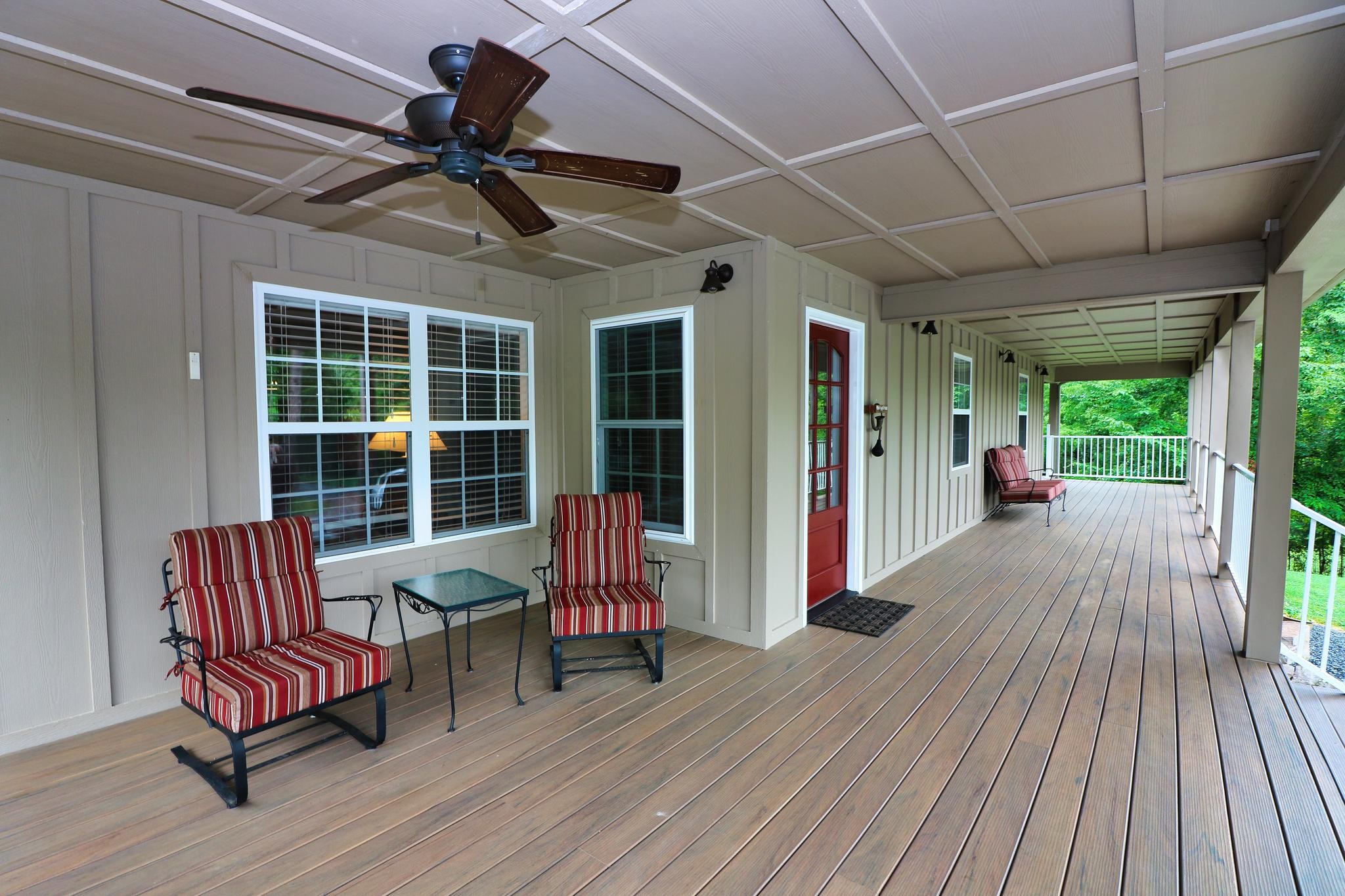 2090 Fairview Road Tellico Plains, TN 37385 - Photo 2 of 40 a view of a chairs in wooden deck