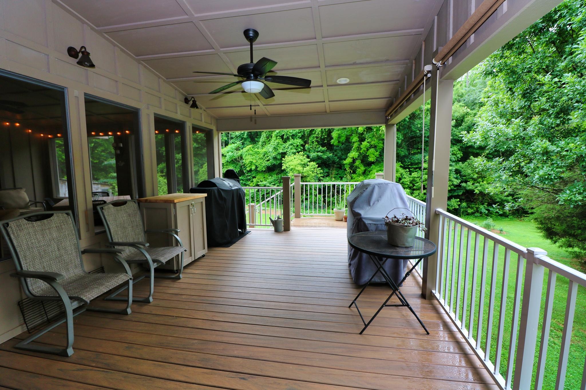 2090 Fairview Road Tellico Plains, TN 37385 - Photo 3 of 40 a view of a porch with furniture and a yard
