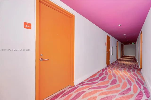 a view of a livingroom with wooden floor